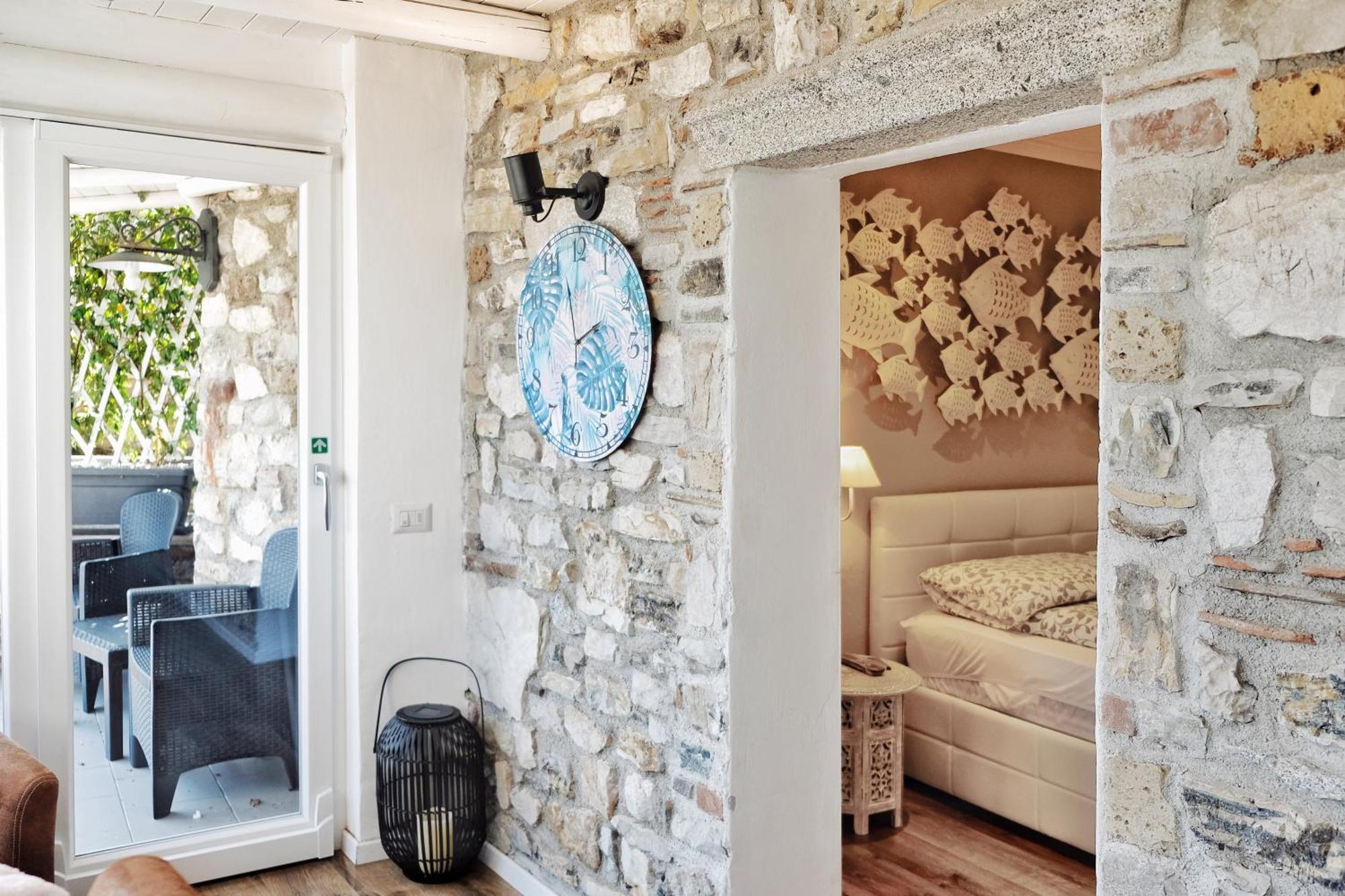 Appartamenti Casa Carlotta ลีโมเนซุลการ์ดา ภายนอก รูปภาพ